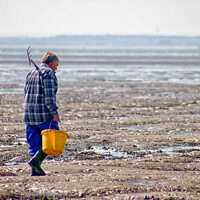Buy canvas prints of 'The bait digger', Thorpe Bay, Essex, UK.  by Peter Bolton