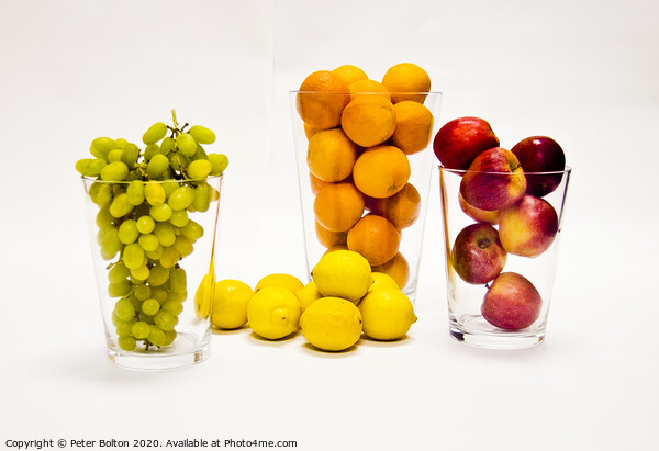 Still life of fresh fruits arranged as graphic design on a white background Picture Board by Peter Bolton