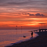 Buy canvas prints of Deep orange sunset over the sea at Westcliff on Sea, Essex, UK. by Peter Bolton