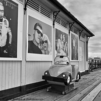 Buy canvas prints of A shelter and children's coin operated ride on Southend pier, Essex, UK. by Peter Bolton