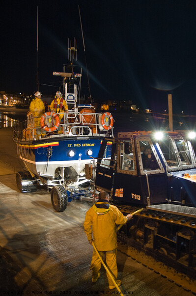 'Back from a shout'. St. Ives lifeboat returning at night. Cornwall, UK Picture Board by Peter Bolton