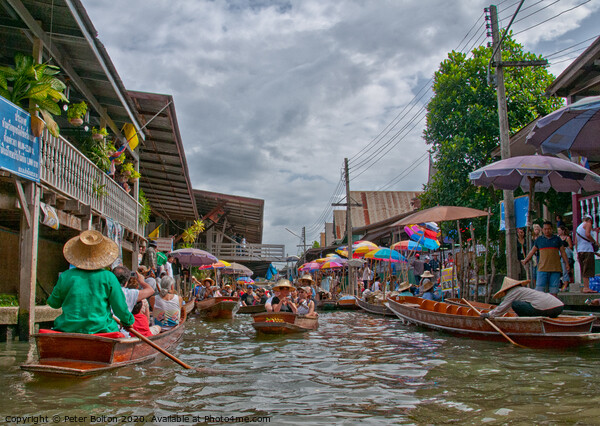A floating market in Bangkok, Thailand. Picture Board by Peter Bolton