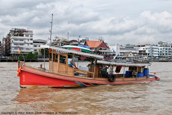 A tourist excursion boat on the Chao Phraya river, Bangkok, Thailand. Picture Board by Peter Bolton