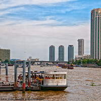 Buy canvas prints of Ferry terminal with cityscape on the Chao Phraya River, Bangkok, Thailand. by Peter Bolton