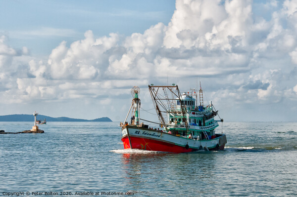 Return to the harbour. Andaman, Thailand. Picture Board by Peter Bolton