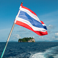 Buy canvas prints of Thailand national flag flying from the stern of a boat. Phang Nga Bay, Thailand. by Peter Bolton