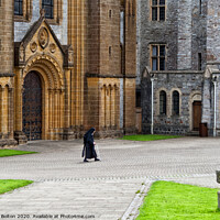 Buy canvas prints of A nun crosses the courtyard at Buckfast Abbey, Dev by Peter Bolton