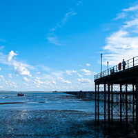 Buy canvas prints of Looking along Southend Pier from the shore towards the pier head. Southend on Sea, Essex, UK.  by Peter Bolton