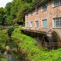 Buy canvas prints of A working mill with waterwheel near Totnes, Devon, UK. by Peter Bolton