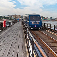Buy canvas prints of A train makes it way along the pier at Southend on Sea, Essex, UK by Peter Bolton