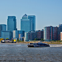 Buy canvas prints of Canary Wharf Business District from the River Thames, London, UK. by Peter Bolton