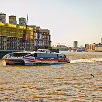 Buy canvas prints of A Clipper Ferry on The River Thames, London. by Peter Bolton