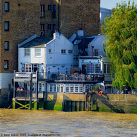 Buy canvas prints of Historic Prospect of Whitby pub in Wapping, London.  by Peter Bolton