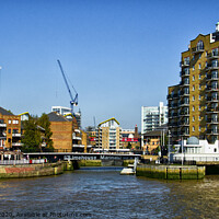 Buy canvas prints of The entrance to Limehouse Marina from the River Thames, London. by Peter Bolton