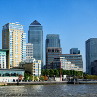 Buy canvas prints of Canary Wharf business district viewed form the Thames on The Isle of Dogs, London, UK. by Peter Bolton