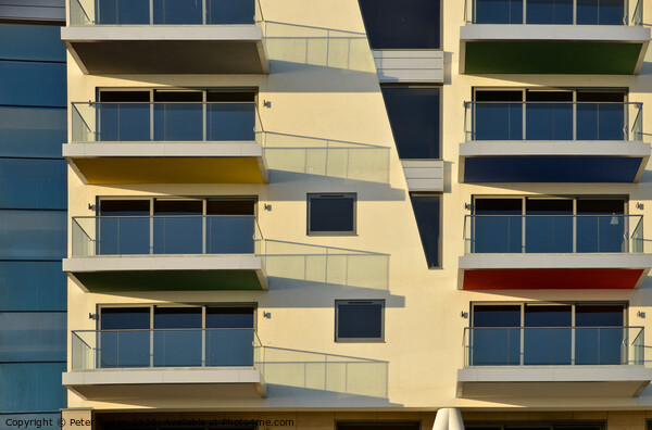 Apartments at Westcliff on Sea form abstract patterns in the sunlight . Picture Board by Peter Bolton
