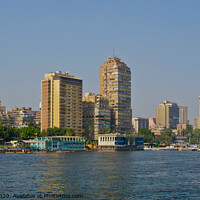 Buy canvas prints of A part of the city skyline from the River Nile, Cairo, Egypt. by Peter Bolton