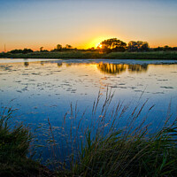 Buy canvas prints of Sunset at he lake at Gunners Park, Shoeburyness, E by Peter Bolton