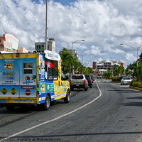 Buy canvas prints of Local ice cream van on Waterfront Drive, Road Town, Tortola, BVI. by Peter Bolton