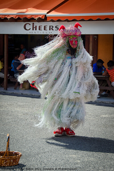 Street performer in St. John's, Antigua, Caribbean. Picture Board by Peter Bolton