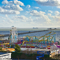 Buy canvas prints of Seafront at Southend on Sea overlooking 'Adventure Island' and the pier. by Peter Bolton