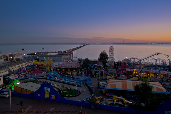 Evening view of the seafront at Southend on Sea showing 'Adventure Island' and the pier. Picture Board by Peter Bolton