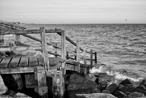 Steps to the beach covered at high tide at East Beach, Shoeburyness, Essex, UK. Picture Board by Peter Bolton