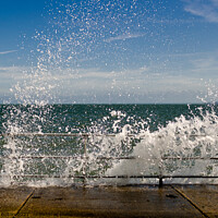 Buy canvas prints of Waves braking over the seawall at The Garrison, Shoeburyness, Essex, UK. by Peter Bolton