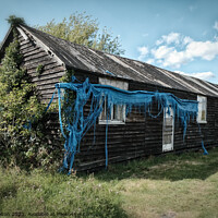 Buy canvas prints of Wooden army barack hut from WWII at Bradwell on Sea, Essex, UK. by Peter Bolton