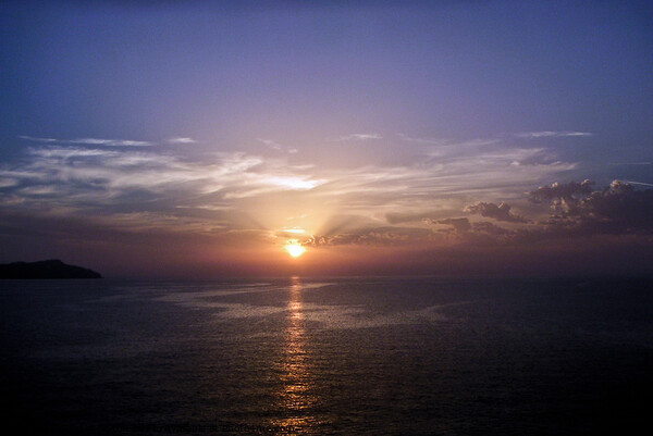 Mediterranean sunset. Off the island of Capri, Italy Picture Board by Peter Bolton