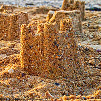 Buy canvas prints of Sandcastles on the beach at Thorpe Bay, Southend on Sea, Essex. by Peter Bolton