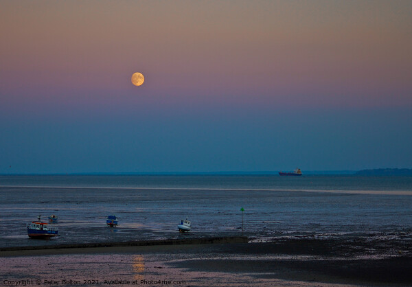 Full moon over the beach at Thorpe Bay, Southend on Sea, Essex, UK. Picture Board by Peter Bolton