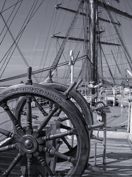 The ships wheel and view across the deck of tall ship Khersones. Southend on sea visit. Picture Board by Peter Bolton