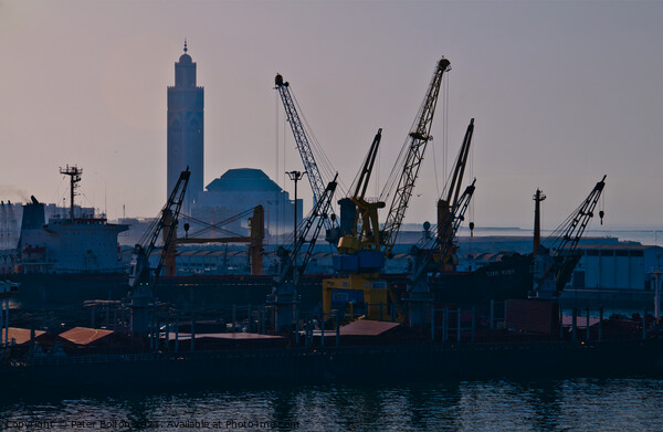 Docks at Casablanca harbour with the Grand Mosque in the background. Picture Board by Peter Bolton