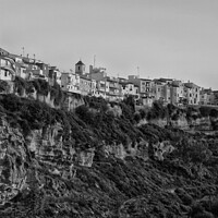 Buy canvas prints of One of the Pueblos Blancos (white villages) near Malaga, Spain. Black and white. by Peter Bolton