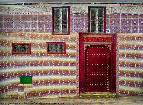 A tiled frontage to a residence in Tetoun town, Morocco. Picture Board by Peter Bolton