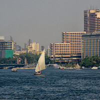 Buy canvas prints of Arab Dhow sailing vessel on the River Nile, Cairo, Egypt. by Peter Bolton