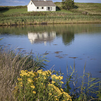 Buy canvas prints of Irish cottage on Sheephaven bay Ireland by jim Hamilton