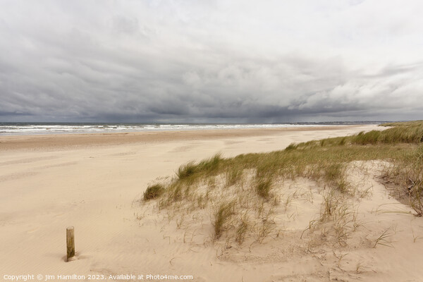 Storm Brewing Over Castlerock Beach Picture Board by jim Hamilton