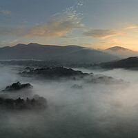 Buy canvas prints of Early Morning Mist Looking Towards Skiddaw and Latrigg by Chester Tugwell