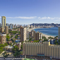 Buy canvas prints of Majestic Sunset Over Benidorm Skyline by Peter Thomas