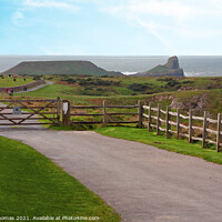 Buy canvas prints of Majestic Worms Head at Rhossili Bay by Peter Thomas