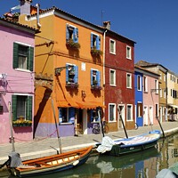 Buy canvas prints of Colourful Buildings in Burano, Venice Lagoon by Charles Kelly