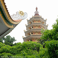 Buy canvas prints of Buddhist Temple. Ho Chi Minh Vietnam by Kevin Plunkett