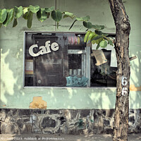 Buy canvas prints of Abandoned street Cafe by Kevin Plunkett