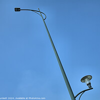 Buy canvas prints of Road Lamp Post. Ho Chi Minh City. Vietnam by Kevin Plunkett