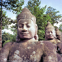 Buy canvas prints of Statues of Angkor Wat, Cambodia  by Kevin Plunkett