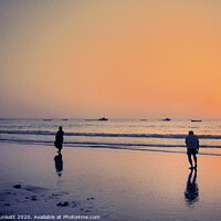 Buy canvas prints of Sunset at Colva Beach, Goa India by Kevin Plunkett