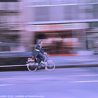 Buy canvas prints of Speed King on a bicycle  by Kevin Plunkett
