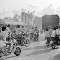 Buy canvas prints of Rush hour in Ho Chi Minh City, Vietnam by Kevin Plunkett